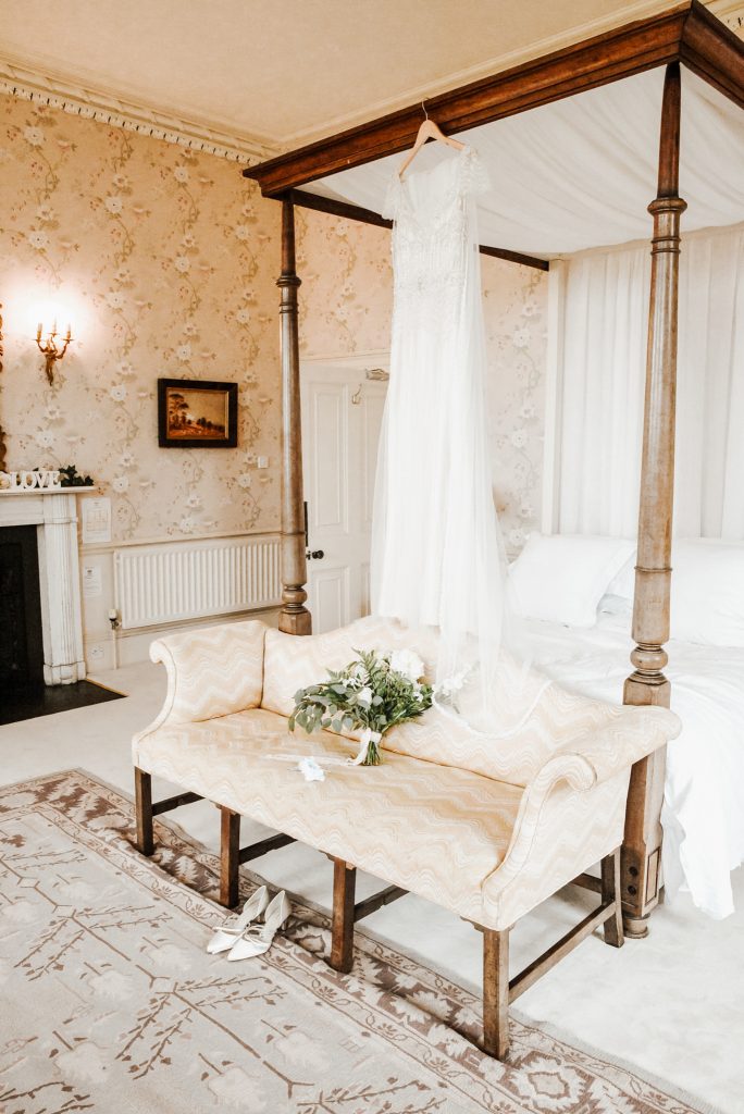 Maggie Sottero wedding dress hanging in elegant bridal suite at Drenagh House Estate