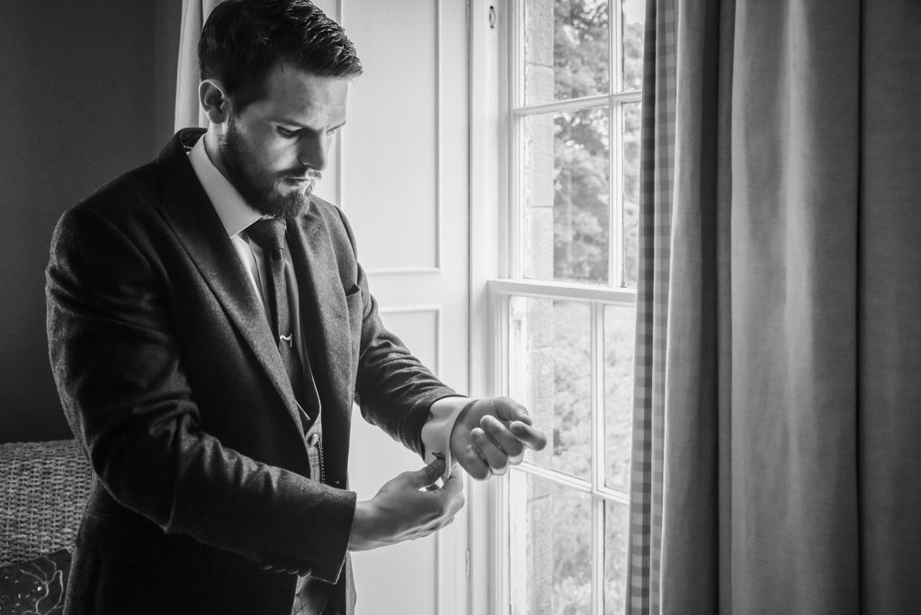 Groom portrait at Drenagh Estate wedding in classic Freddie Hatchet suit