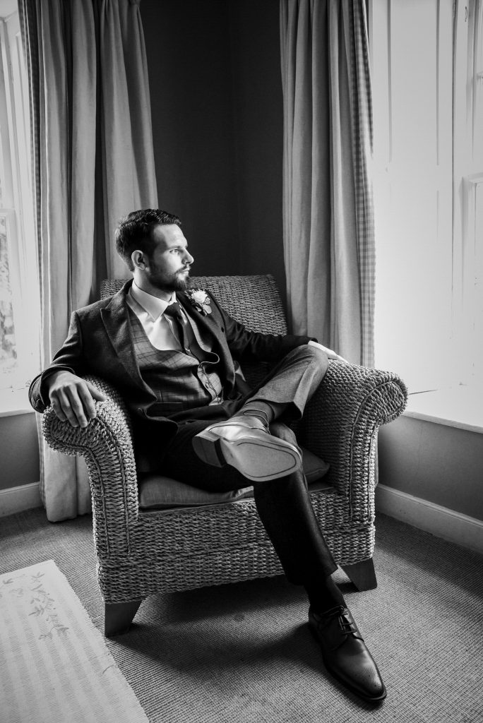 Groom portrait at Drenagh Estate wedding in classic Freddie Hatchet suit