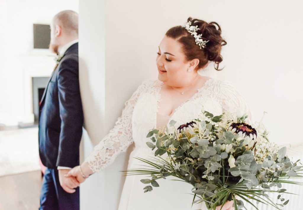 Bride and groom embracing during romantic wedding portraits in Northern Ireland Millbrook Lodge Ballynahinch