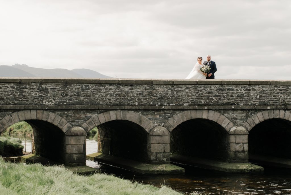 Bride and groom embracing during romantic wedding portraits in Northern Ireland Dundrum