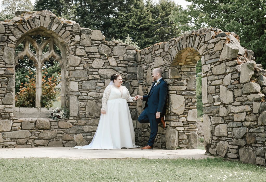 Bride and groom embracing during romantic wedding portraits in Northern Ireland Millbrook Lodge Ballynahinch